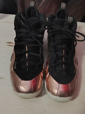Nike Men’s Metallic Rose Gold and Black Foamposite Sneakers